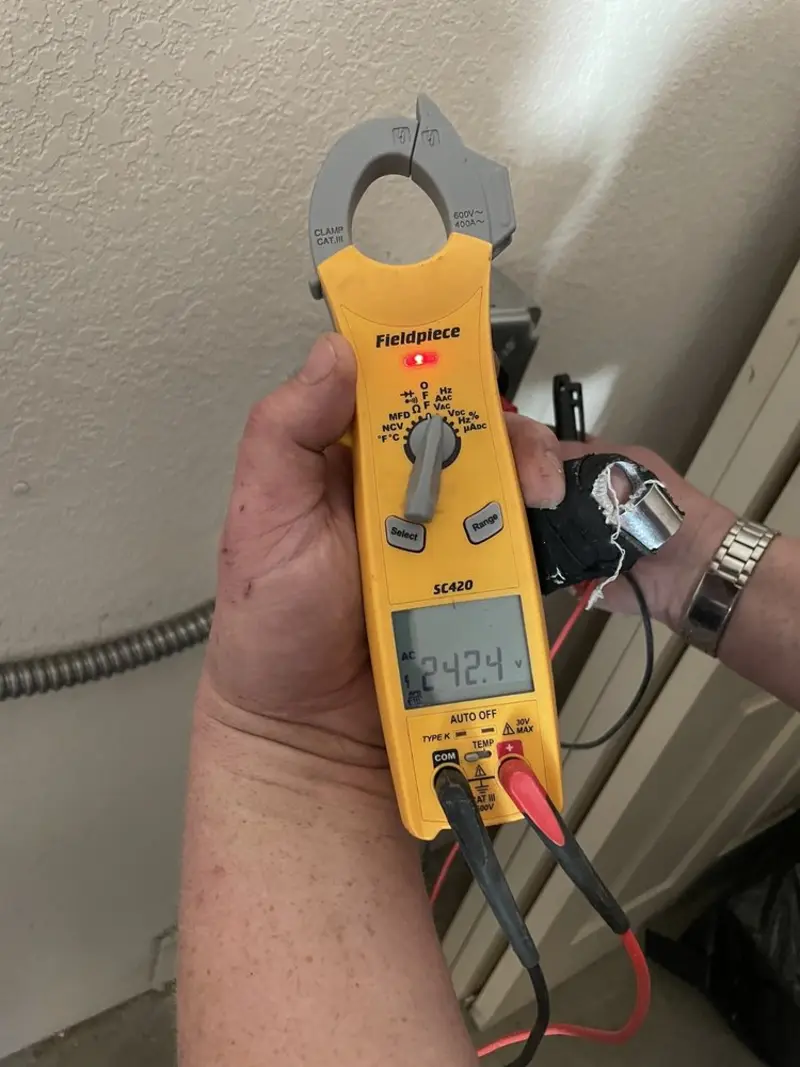 Voltage testing with clamp meter during Aluminum Wiring Replacement in Haysville
